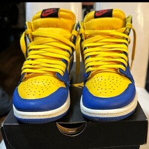 Jordan Retro 1 High OG youth size 2 in varsity maize/game royal-sail color.